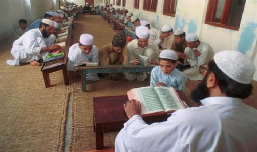 Teacher Teaching Holy Quran to Students